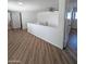 Upstairs hallway with wood-look flooring at 8214 E Mcdonald Dr, Scottsdale, AZ 85250