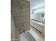 Bathroom with double sinks, tile shower, and bathtub at 8214 E Mcdonald Dr, Scottsdale, AZ 85250