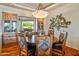 Elegant dining room with a large wood table and chandelier at 18714 E Ironwood Cir, Rio Verde, AZ 85263