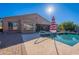 Sparkling pool with patio and umbrella, near the house at 3076 E La Costa Dr, Gilbert, AZ 85298