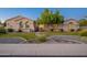 Beautiful house exterior with manicured landscaping and a welcoming front yard at 3076 E La Costa Dr, Gilbert, AZ 85298