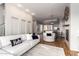 Open living room and kitchen area with hardwood floors at 6745 N 93Rd Ave # 1133, Glendale, AZ 85305