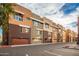 Community view of townhomes with parking at 6745 N 93Rd Ave # 1133, Glendale, AZ 85305