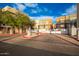 Community entrance with gated access and signage at 6745 N 93Rd Ave # 1133, Glendale, AZ 85305