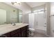 Bathroom with a single vanity, shower, and bathtub at 6745 N 93Rd Ave # 1133, Glendale, AZ 85305