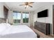 Spacious bedroom with large windows and a ceiling fan at 6745 N 93Rd Ave # 1133, Glendale, AZ 85305
