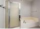 Clean bathroom with a bathtub and shower at 6745 N 93Rd Ave # 1133, Glendale, AZ 85305