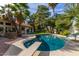 Relaxing pool area with diving board, palm trees, and grassy lawn at 10338 E San Salvador Dr, Scottsdale, AZ 85258