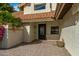 Front entry with decorative door and brick pavers at 10338 E San Salvador Dr, Scottsdale, AZ 85258