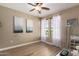Spacious bedroom with hardwood floors and ample natural light at 7297 N Scottsdale Rd # 1004, Paradise Valley, AZ 85253