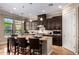 Modern kitchen boasts granite countertops, stainless steel appliances, and ample cabinetry at 7297 N Scottsdale Rd # 1004, Paradise Valley, AZ 85253