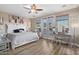 Elegant Primary bedroom with a large bed and access to a private balcony at 7297 N Scottsdale Rd # 1004, Paradise Valley, AZ 85253