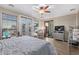 Bright bedroom with king-size bed, balcony access, and city views at 7297 N Scottsdale Rd # 1004, Paradise Valley, AZ 85253