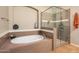 Primary bathroom with soaking tub and a separate shower at 7297 N Scottsdale Rd # 1004, Paradise Valley, AZ 85253