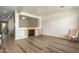 Bright and airy living room with fireplace and hardwood floors at 7297 N Scottsdale Rd # 1004, Paradise Valley, AZ 85253