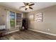 Bedroom featuring hardwood floors and large windows with curtains at 7297 N Scottsdale Rd # 1004, Paradise Valley, AZ 85253