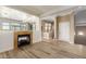 Open living room with a fireplace and built-in shelving at 7297 N Scottsdale Rd # 1004, Paradise Valley, AZ 85253