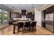 Spacious kitchen with stainless steel appliances, granite countertops and an island at 7297 N Scottsdale Rd # 1004, Paradise Valley, AZ 85253