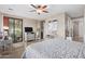 Spacious bedroom with a king-size bed and access to a private balcony at 7297 N Scottsdale Rd # 1004, Paradise Valley, AZ 85253