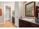 Bathroom with double sinks and granite countertops at 7297 N Scottsdale Rd # 1004, Paradise Valley, AZ 85253