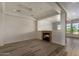 Living area showcasing a fireplace and an open floor plan at 7297 N Scottsdale Rd # 1004, Paradise Valley, AZ 85253