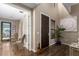 Entry hall with hardwood floors, a door, and artwork at 7297 N Scottsdale Rd # 1004, Paradise Valley, AZ 85253