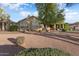 Charming backyard with a patio and desert landscaping at 2606 N 159Th Dr, Goodyear, AZ 85395