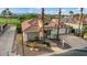 Aerial view of a beautiful home with a large driveway and landscaping at 2606 N 159Th Dr, Goodyear, AZ 85395