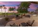 Relaxing patio with seating area and stunning sunset views at 2606 N 159Th Dr, Goodyear, AZ 85395