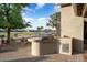 Built-in outdoor grill with stone countertop at 2606 N 159Th Dr, Goodyear, AZ 85395