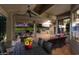 Spacious covered patio with outdoor dining and golf course views at 2606 N 159Th Dr, Goodyear, AZ 85395