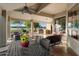Spacious patio with seating, a built-in grill, and golf course views at 2606 N 159Th Dr, Goodyear, AZ 85395