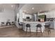 Modern kitchen with white cabinets and a breakfast bar at 2222 S Yellow Wood --, Mesa, AZ 85209