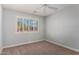 Well-lit bedroom featuring window shutters and carpet flooring at 2222 S Yellow Wood --, Mesa, AZ 85209