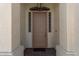 Front entrance with a brown door and glass accents at 2222 S Yellow Wood --, Mesa, AZ 85209