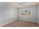 Bright bedroom with neutral walls, carpet, and window shutters at 2222 S Yellow Wood --, Mesa, AZ 85209