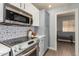 Updated kitchen featuring stainless steel appliances and a view into another room at 2222 S Yellow Wood --, Mesa, AZ 85209