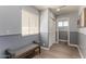 Hallway with bench seating, wainscoting, and wood-look flooring at 2222 S Yellow Wood --, Mesa, AZ 85209
