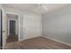 Bedroom with carpet, ceiling fan, and double door closet at 2222 S Yellow Wood --, Mesa, AZ 85209