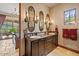 Elegant bathroom with double vanity and walk-in shower at 9514 E Madera Dr, Scottsdale, AZ 85262