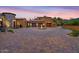 Circular driveway with a fountain and manicured landscaping at 9514 E Madera Dr, Scottsdale, AZ 85262