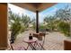 Relaxing patio with seating area and desert landscape views at 7946 E Soaring Eagle Way, Scottsdale, AZ 85266