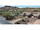 House with driveway and landscaping, aerial view at 4126 S Last Chance Trl, Gold Canyon, AZ 85118