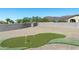 Artificial turf putting green in a gravel backyard at 4126 S Last Chance Trl, Gold Canyon, AZ 85118