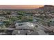 Aerial view showcasing house, landscape, and distant mountain range at 4126 S Last Chance Trl, Gold Canyon, AZ 85118