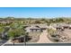 Aerial view of house and surrounding landscape at 4126 S Last Chance Trl, Gold Canyon, AZ 85118