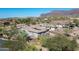 Aerial view of single-story home with mountain backdrop at 4126 S Last Chance Trl, Gold Canyon, AZ 85118