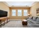 Spacious Gathering room with large TV, comfortable seating, and neutral decor at 4126 S Last Chance Trl, Gold Canyon, AZ 85118