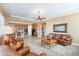 Open concept living room with a view of the kitchen and island at 4126 S Last Chance Trl, Gold Canyon, AZ 85118