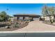 Single-story home with a brick driveway and desert landscaping at 4126 S Last Chance Trl, Gold Canyon, AZ 85118